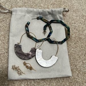 3 pairs of dangling earrings. Sold as shown!